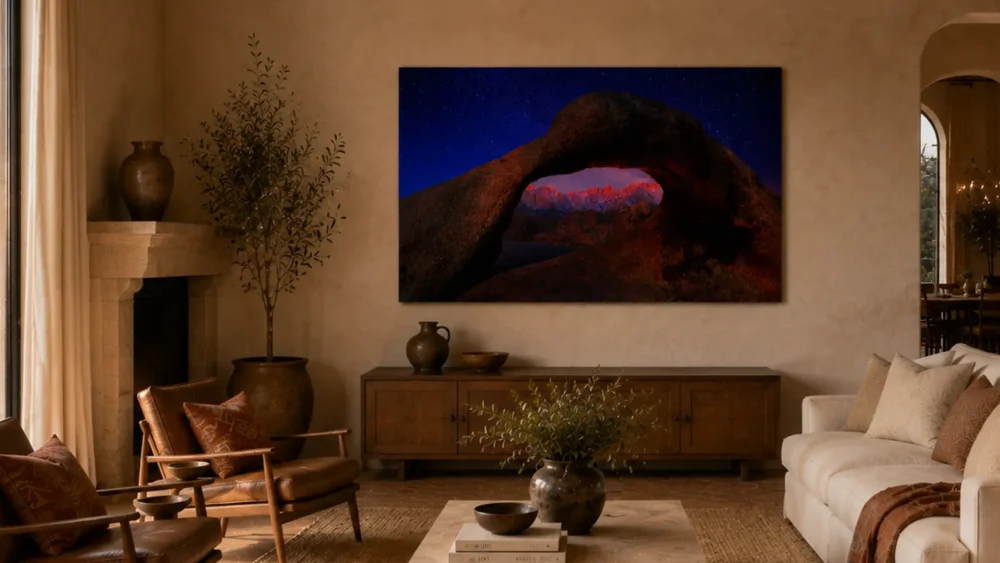 Starlit Window — Mobius Arch Alabama Hills fine art print in a Tuscan-influenced hilltop luxury residence with cream plaster walls, wood beams, and sunset city view